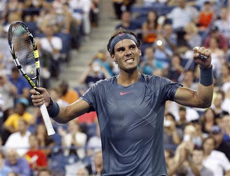 Rafael Nadal of Spain celebrates defeating Philipp Kohlschreiber of Germany at the U.S. Open tennis championships in New York, September 2, 2013. REUTERS/Adam Hunger