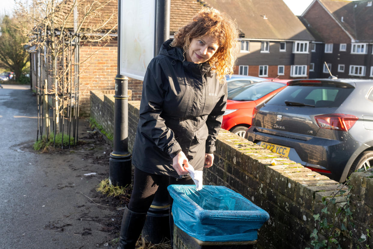 Olivia Post by the litter bin which she was fined for using. See SWNS story SWLNbin. A midwife, a pensioner and a balloon-artist living in one flat block have all been slapped with â€œintimidating and flabbergastingâ€ Â£400 fines for fly-tipping. One of the three women was billed for cleaning waste from the carpark in front of the flats, another for putting the bins out at the wrong time, and the third does not know why she was fined. Rother District Council have fined the small block of flats a total of Â£1,200, and the midwife has even been summoned to court. There is no option to appeal the fines.   The council have offered to reimburse Ms Post's fines in a 