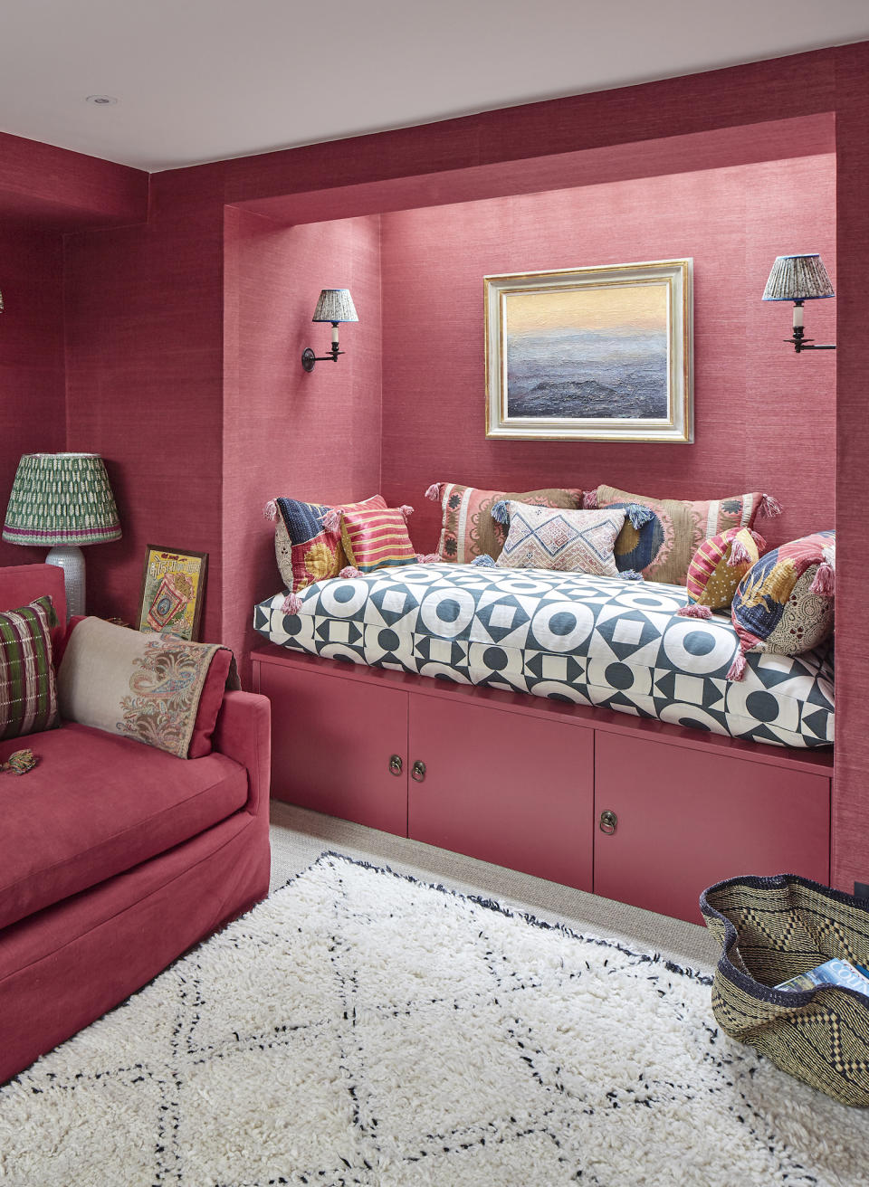 Pink living room with built in storage bench