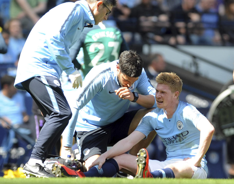 Manchester City's Kevin De Bruyne receives treatment during the English Premier League soccer match between Manchester City and Tottenham Hotspur at Etihad stadium in Manchester, England, Saturday, April 20, 2019. (AP Photo/Rui Vieira)