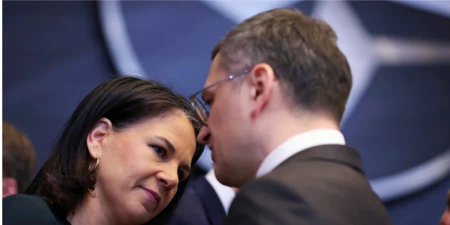 Foreign Minister of Ukraine Dmytro Kuleba talks with German Foreign Minister Annelena Burbok during the Ukraine-NATO Council meeting in Brussels, Belgium on April 4, 2024