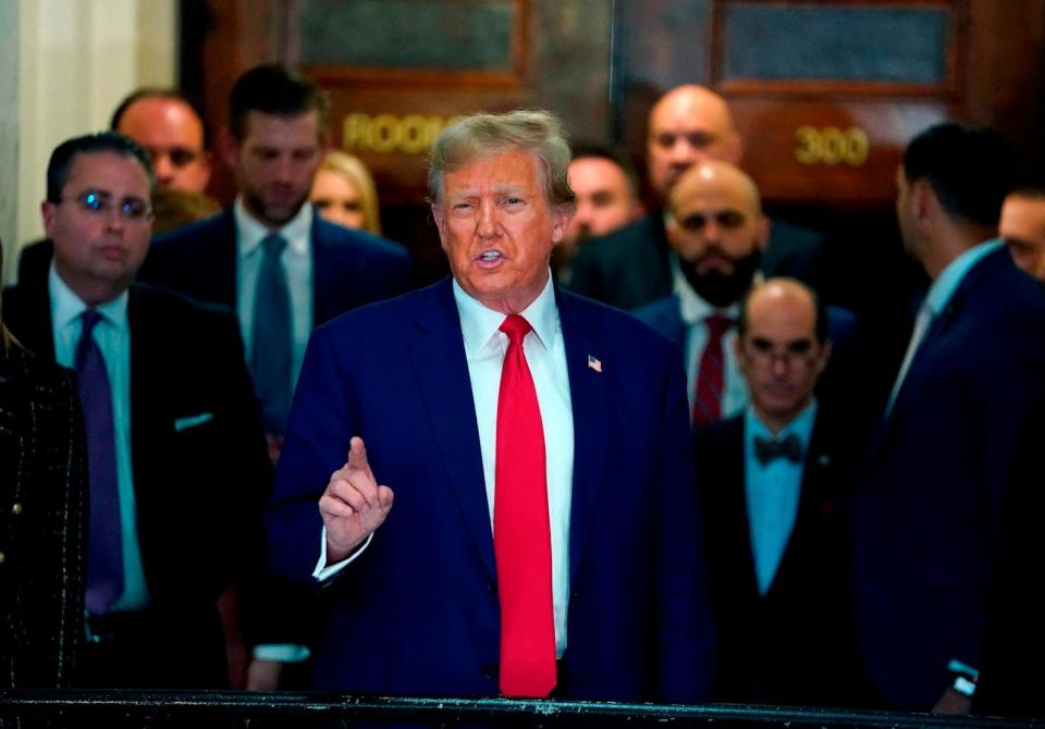 PHOTO: Former President Donald Trump speaks to the press as he arrives at the New York State Supreme Court during the civil fraud trial against the Trump Organization, in New York City, Jan. 11, 2024.  (Timothy A. Clary/AFP via Getty Images)