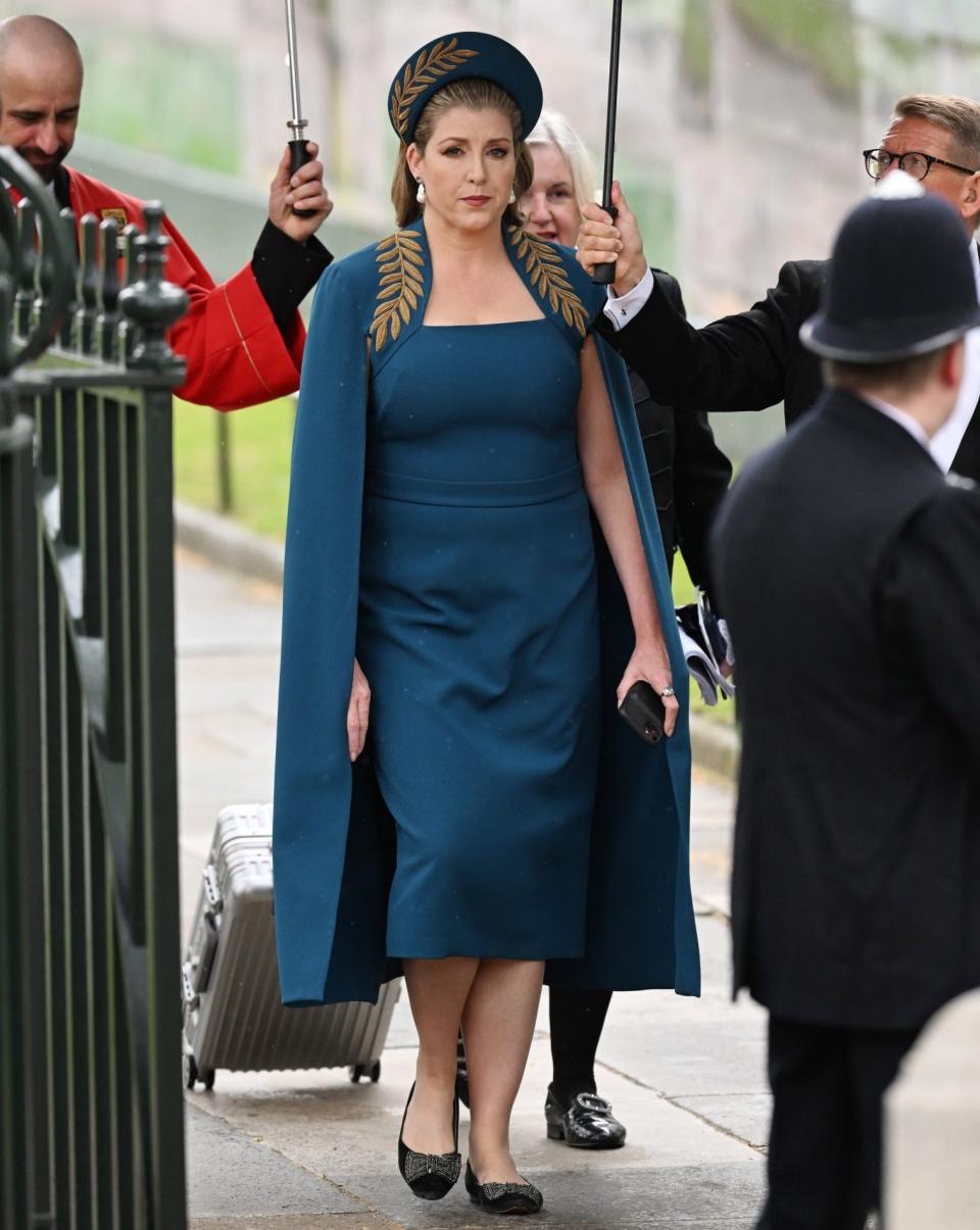 Mordaunt’s teal cape dress was by London-based label Safiyaa - Jeff Spicer/Getty Images Europe