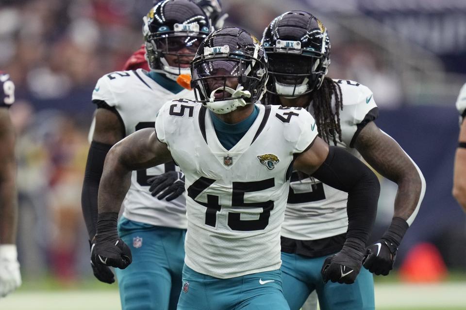 Jacksonville Jaguars linebacker K'Lavon Chaisson (45) celebrates a play against the Houston Texans during the first half of an NFL football game in Houston, Sunday, Jan. 1, 2023. (AP Photo/Eric Christian Smith)