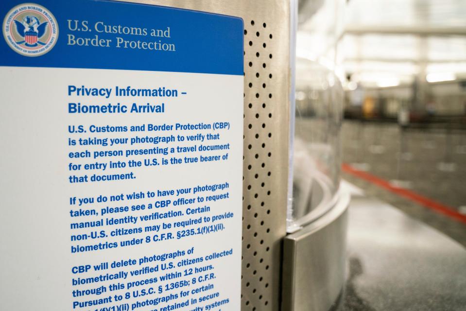 A sign explains the use and purpose of facial recognition biometrics for international travelers entering U.S. Customs and Border Protection at McNamara Terminal at Detroit Metro Airport in Romulus on July 28, 2023.