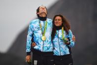 <p>Santiago Lange of Argentina and Cecilia Carranza Saroli of Argentina celebrate winning the gold medal in the Nacra 17 Mixed class on Day 11 of the Rio 2016 Olympic Games at the Marina da Gloria on August 16, 2016 in Rio de Janeiro, Brazil. (Photo by Laurence Griffiths/Getty Images) </p>