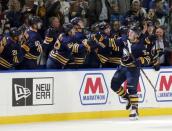 Nov 10, 2018; Buffalo, NY, USA; Buffalo Sabres center Casey Mittelstadt (37) celebrates his game winning shootout goal against the Vancouver Canucks at KeyBank Center. Timothy T. Ludwig-USA TODAY Sports