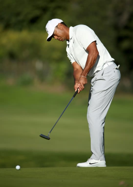 Tiger Woods's eight bogeys included three in a row on the back nine as he battled to a five-over par 76 missing the cut at the Genesis Open