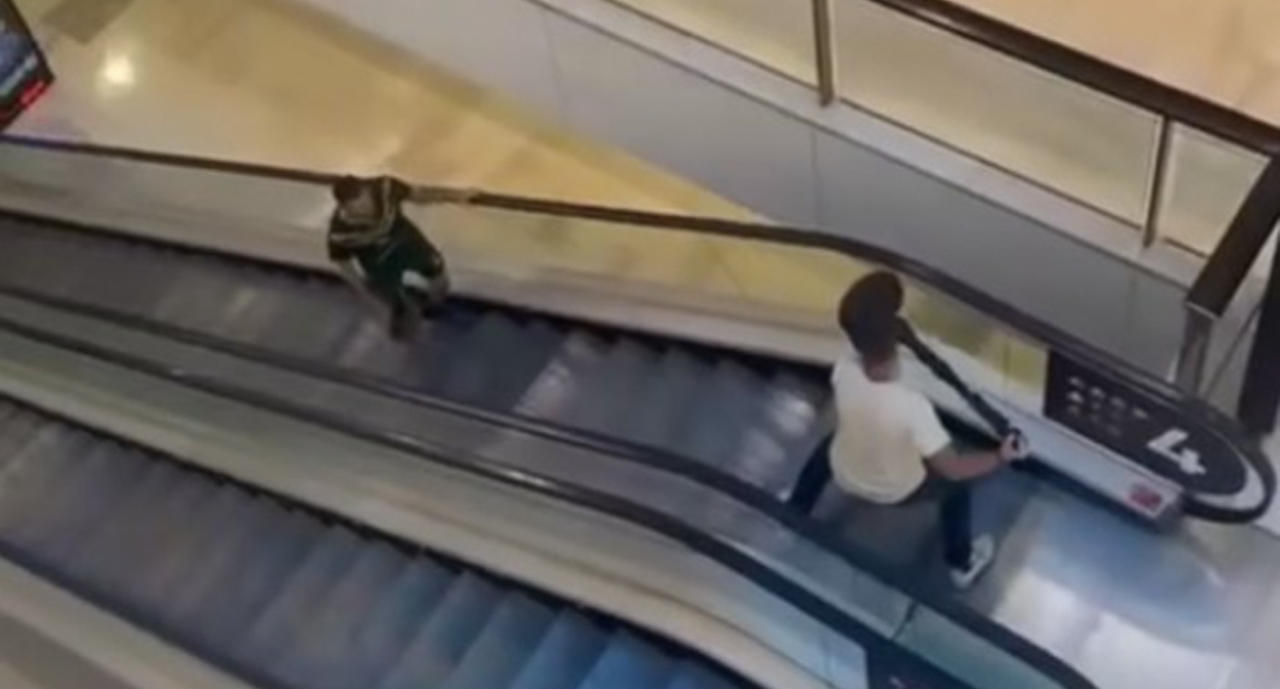 Video shows a man trying to stall a man holding a knife on an escalator. Source: X