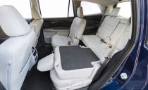 <p>All of the rear seats can be folded flat to accommodate bulky cargo. If you're intrigued by the Pilot but don't need school-bus seating, Honda now offers <a href="https://www.caranddriver.com/honda/passport" rel="nofollow noopener" target="_blank" data-ylk="slk:the two-row Passport;elm:context_link;itc:0;sec:content-canvas" class="link ">the two-row Passport</a>. It's based on the Pilot (the two are nearly identical from the B-pillars forward, and share the same wheelbase dimension) but is stubbier in length and features slightly different rear-end styling. </p>