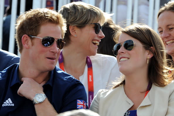 Prince Harry and Princess Eugenie are pictured watching the London 2012 Olympics. Picture: Getty Images