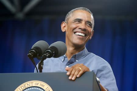 U.S. President Barack Obama delivers remarks at Laborfest 2014 at Maier Festival Park in Milwaukee, Wisconsin September 1, 2014. REUTERS/Jonathan Ernst