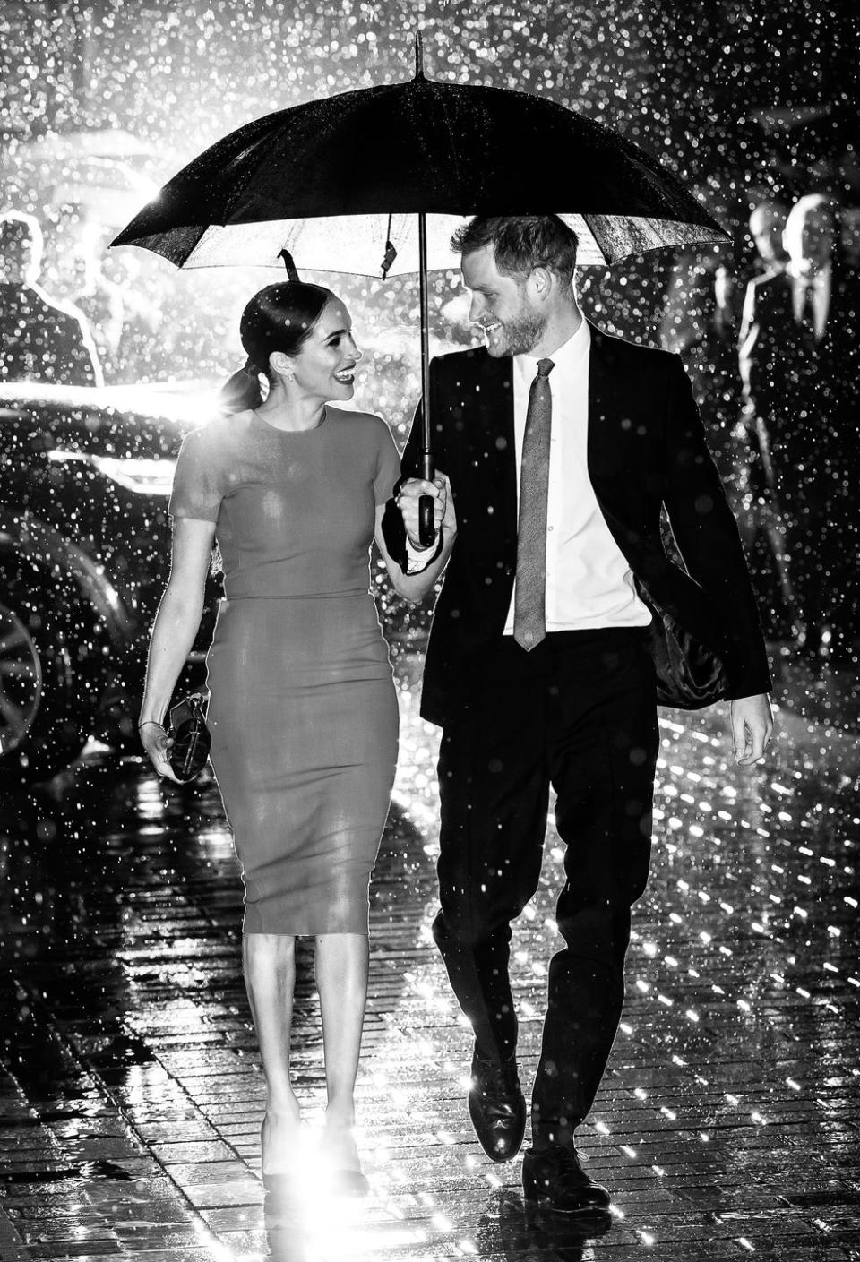 <p>This photo, taken at the start of the Sussexes' so-called farewell tour by Samir Hussein, <a href="https://www.townandcountrymag.com/society/tradition/a31290415/meghan-markle-prince-harry-umbrella-photo-endeavour-fund-awards-interview/" rel="nofollow noopener" target="_blank" data-ylk="slk:is being called historic for how it captured the moment.;elm:context_link;itc:0;sec:content-canvas" class="link ">is being called historic for how it captured the moment.</a></p>