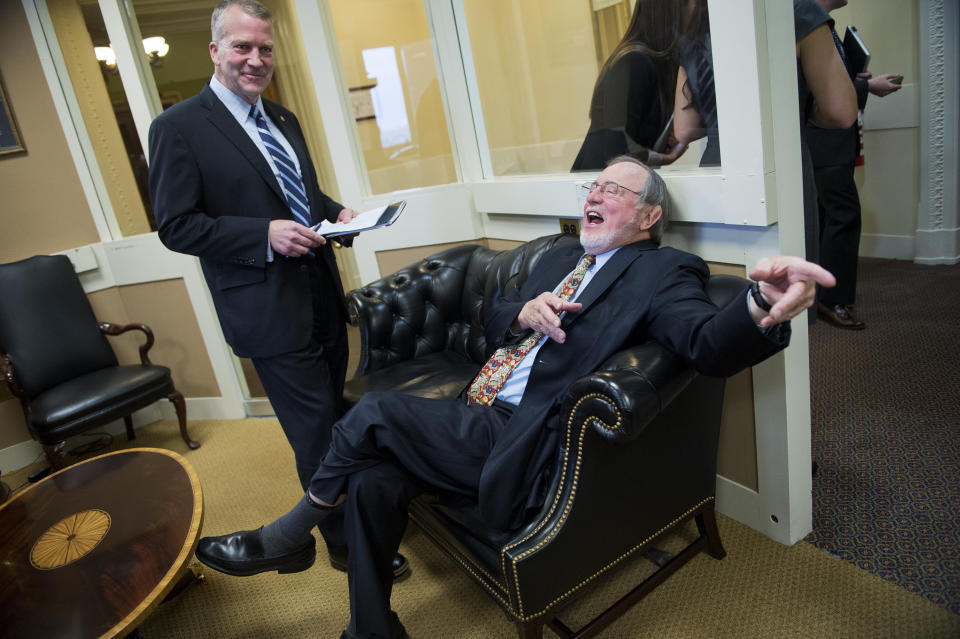 Sen. Dan Sullivan (R-Alaska), left, and Rep. Don Young (R-Alaska) talk before a news conference in the Capitol's Senate studio to "respond to the Obama administration's efforts to lock up millions of acres of the nation's richest oil and natural gas prospects on the Arctic coastal plain and move to block development of Alaska's offshore resources" on Jan. 26, 2015.