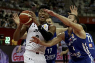 Japan's Rui Hachimura keeps the ball from Czech Republic's Martin Kriz during a Group E match for the FIBA Basketball World Cup at the Shanghai Oriental Sports Center in Shanghai on Tuesday, Sept. 3, 2019. (AP Photo/Ng Han Guan)