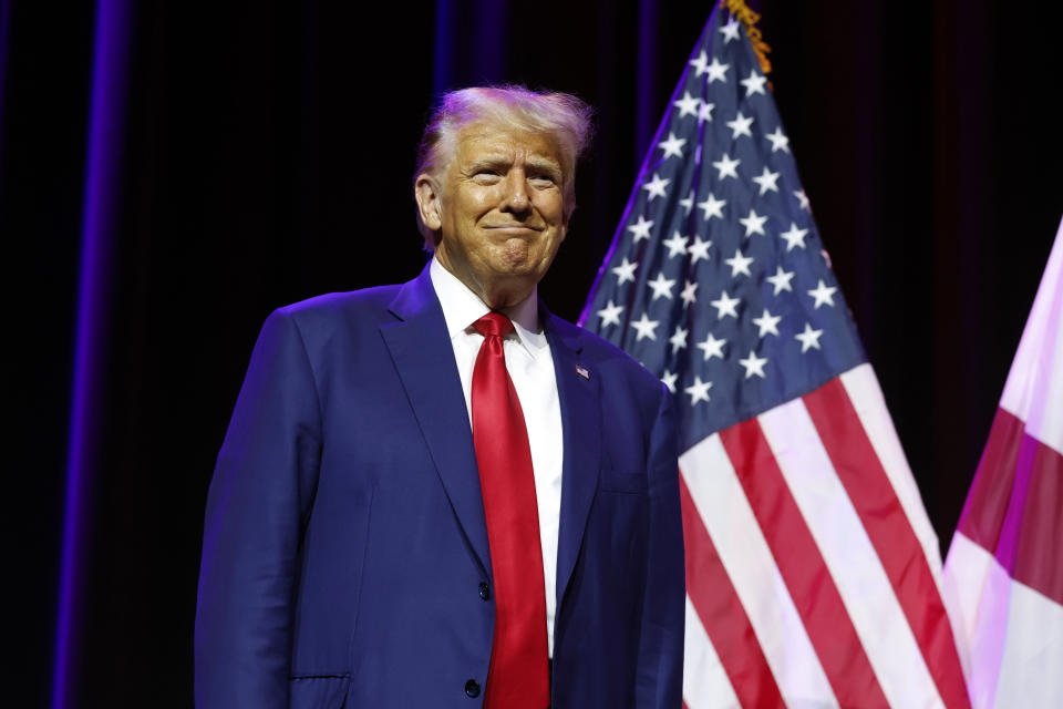 Former President Donald Trump arrives to speak at a fundraiser event for the Alabama Republican Party, Friday, Aug. 4, 2023, in Montgomery, Ala. (AP Photo/Butch Dill)