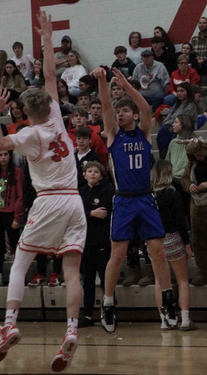 Buckeye Trail senior Isaac Beaver knocks down a 3-poinyer during Tuesday's non-league match-up at Union Local.