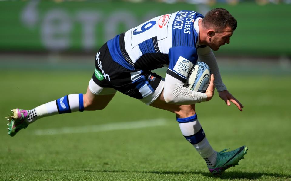 Ben Spencer of Bath Rugby scores his team's fourth try against Northamton