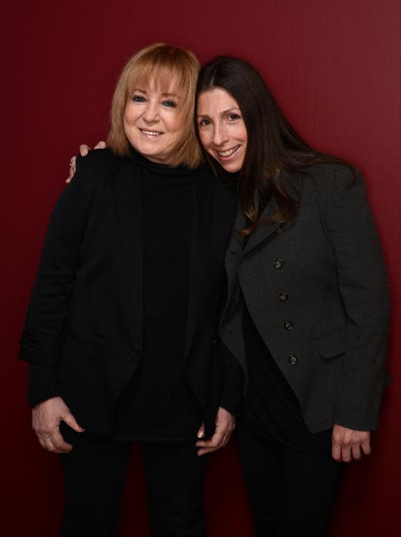 Filmmakers Shosh Shlam (L) and Hilla Medalia pose for a portrait during the 2014 Sundance Film Festival in Utah on January 21, 2014