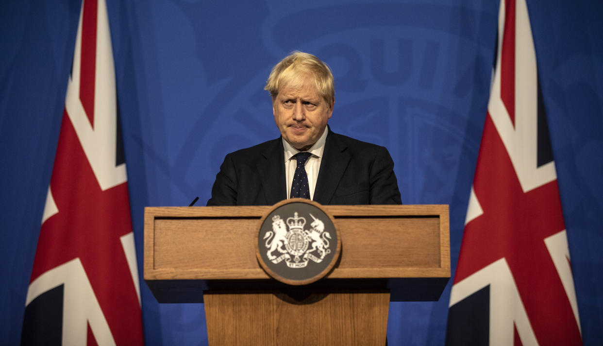 LONDON, ENGLAND - SEPTEMBER 14: Britain's Prime Minister Boris Johnson attends a press conference in the Downing Street Briefing Room on September 14, 2021 in London, England. The prime minister's briefing was preceded by his health secretary's appearance before the House of Commons, in which he laid out the country's strategies for managing the pandemic through the autumn and winter. (Photo by Richard Pohle - WPA Pool/Getty Images)