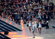 Singer Rod Stewart performs during the Opening Ceremony at Celtic Park.