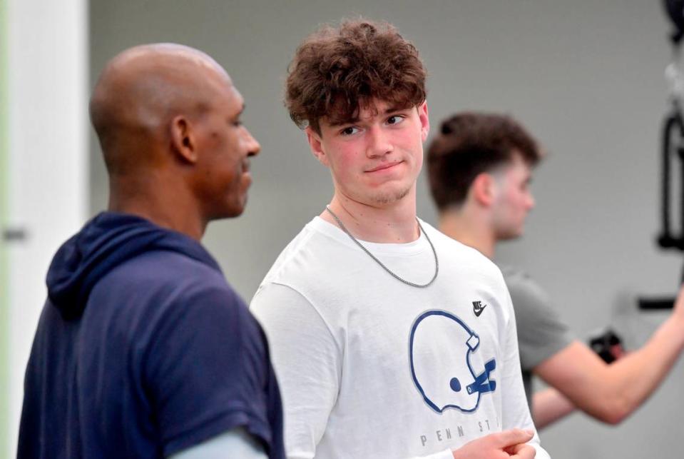 Penn State quarterback Drew Allar talks to coaches and players during weightlifting session on Thursday, March 2, 2023. Abby Drey/adrey@centredaily.com