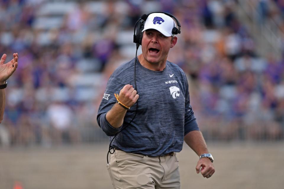 Kansas State offensive line coach Conor Riley encourages his players during a 2021 game against Southern Illinois.