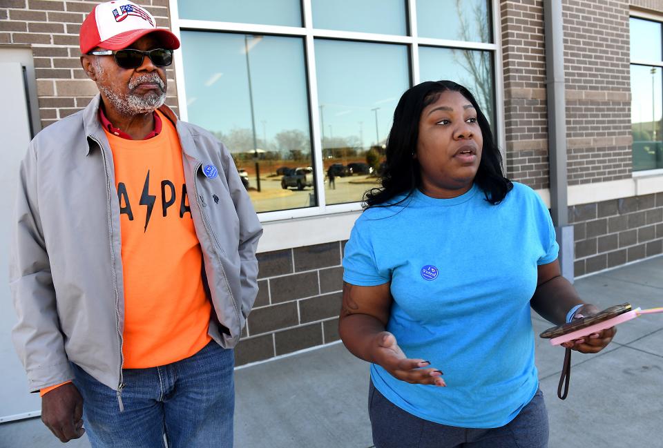 For Jamarius Collins, 32, it is her body, her choice. Collins walked out of the Dr. T.K. Gregg Community Center precinct alongside her grandfather James Woodruff, 75. Woodruff is vocal about why voting matters to the community and is proud of his granddaughter for voting. (Alex Hicks Photo/Spartanburg Herald-Journal)