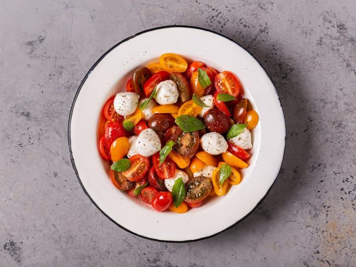 This simple dish is best, of course, when cherry tomatoes are in season – that it gets better as it sits is a boon (Getty/iStock)