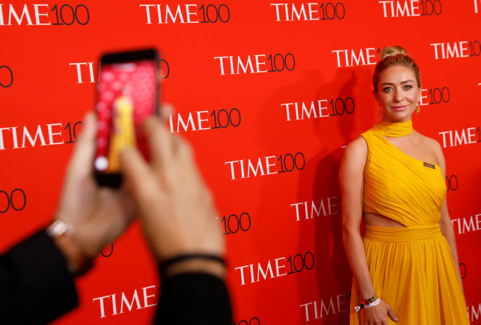 Bumble CEO Whitney Wolfe Herd has her photo taken on the red carpet after arriving for the TIME 100 Gala in Manhattan, New York, U.S., April 24, 2018. REUTERS/Shannon Stapleton
