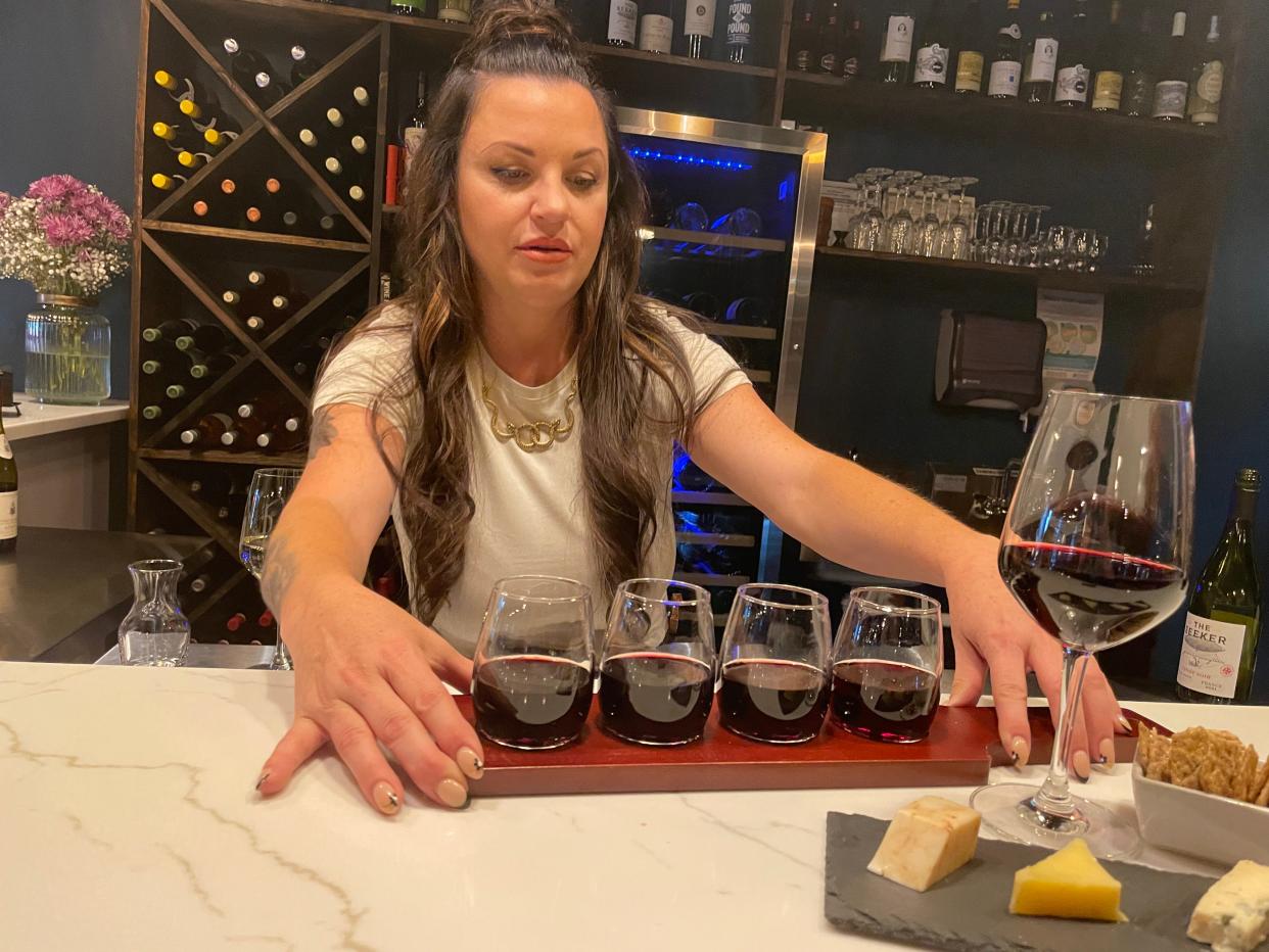 Alicia Kiernan prepares a flight of wine to pair with a flight of cheese at Sparrow Wine Bar, 141 West End Ave. in Farragut, June 29, 2023.