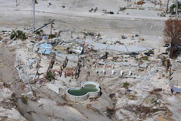 FORT MYERS BEACH,FLORIDA - SEPTEMBER 29: In an aerial view, damaged buildings are seen as Hurricane Ian passed through the area on September 29, 2022 in Fort Myers Beach, Florida. The hurricane brought high winds, storm surge and rain to the area causing severe damage. (Photo by Joe Raedle/Getty Images)