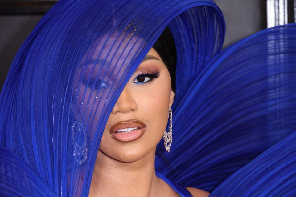 Cardi B wears a blue sculptural Guarav Gupta creation.