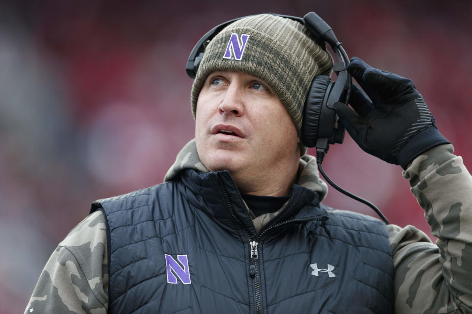 Nov 13, 2021; Madison, Wisconsin, USA; Northwestern Wildcats head coach Pat Fitzgerald looks to the scoreboard during the second quarter against the Wisconsin Badgers at Camp Randall Stadium. Mandatory Credit: Jeff Hanisch-USA TODAY Sports