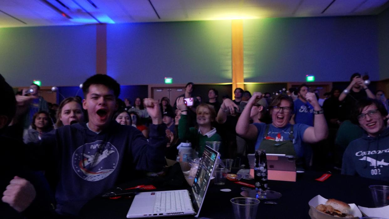 Embry-Riddle Aeronautical University students celebrate the landing of Odysseus, the Intuitive Machines spacecraft, on the Moon Thursday evening. The lunar lander carried a camera built by ERAU students until about 30 meters above the Moon's surface. The camera was ejected in an attempt to capture the first-ever selfie of a spacecraft's extraterrestrial landing.