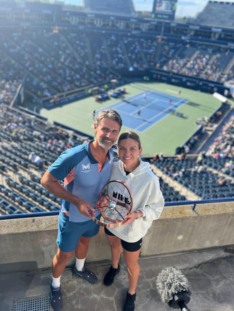 In happier times: Patrick Mouratoglu and Simona Halep