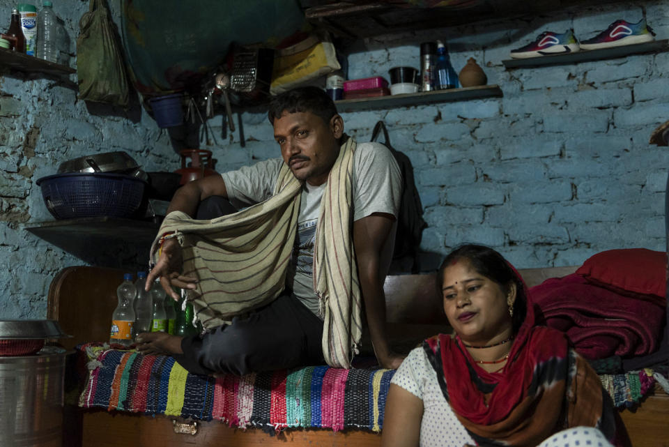 Raj Kumari, 30, and husband Santosh rest at their home in New Delhi, India, on Sept. 5, 2023. (Saumya Khandelwal for NBC News)