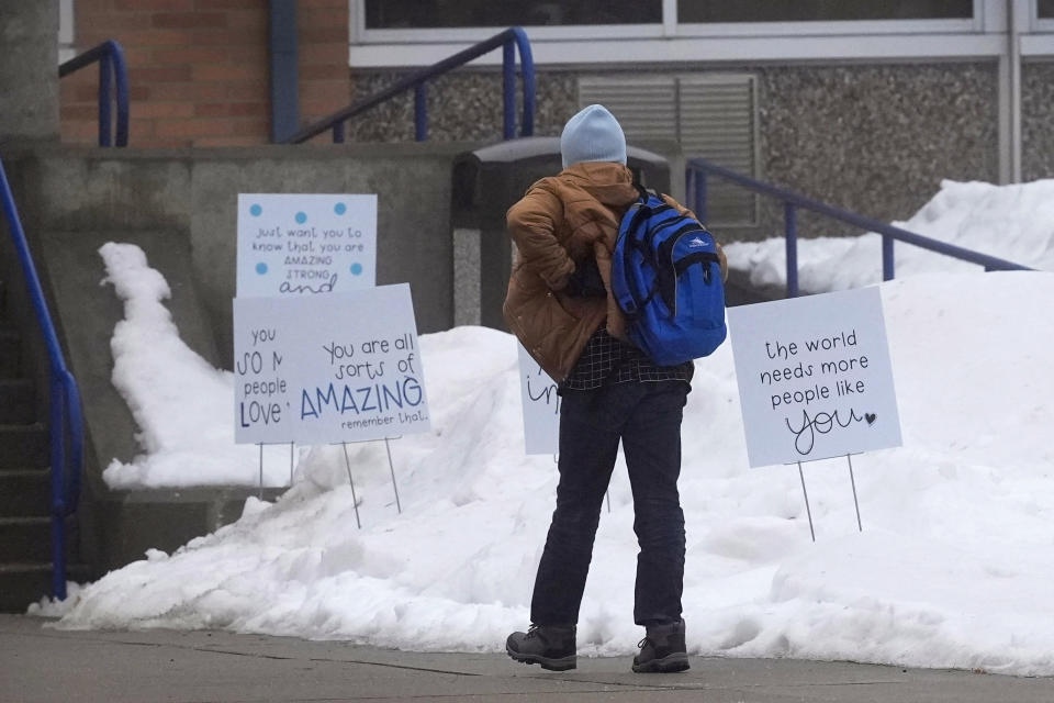 A student arrives at Perry Middle School, Thursday, Jan. 25, 2024, in Perry, Iowa. Middle school students returned to classes Thursday for the first time since a high school student opened fire in a shared cafeteria, killing two people and injuring six others. (AP Photo/Charlie Neibergall)