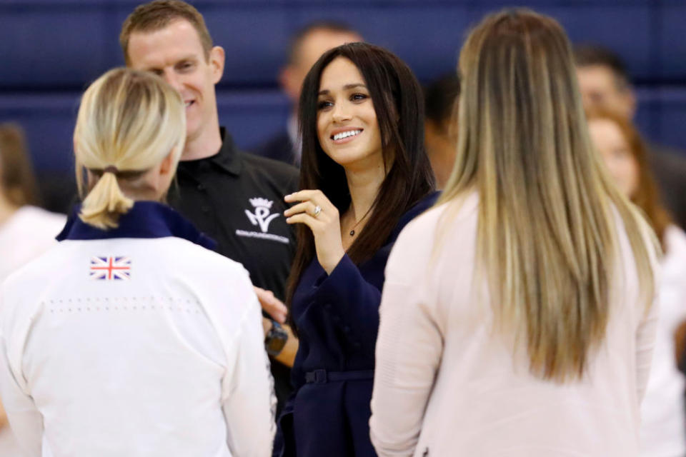 While Meghan's fans will recognise the look from her red carpet days in Hollywood, this was the first time she has straightened her hair since joining the palace ranks