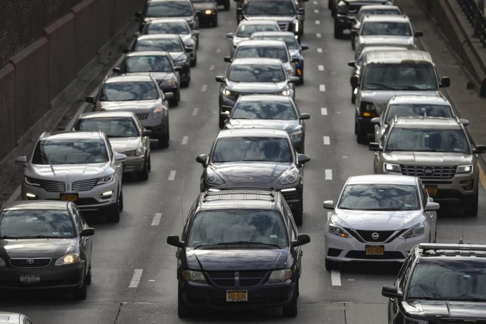 Heavy traffic moves along the Brooklyn/Queens Expressway in New York on Tuesday (Drew Angerer/Getty Images)