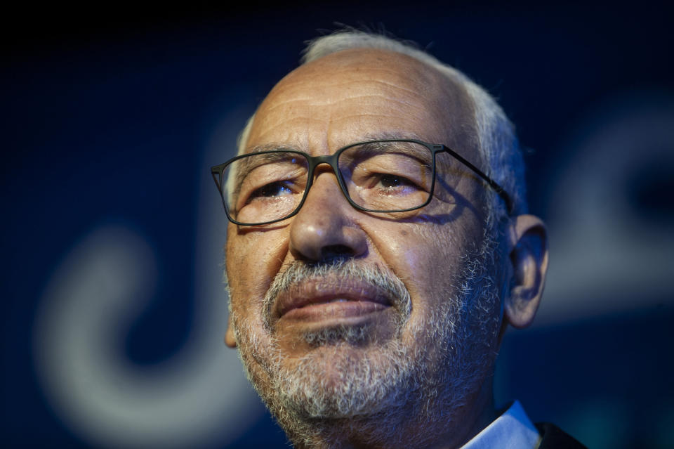 FILE - In this Oct. 3, 2019 file photo, Islamist party leader and parliament speaker Rached Ghannouchi speaks during a meeting in Tunis, Tunisia. Rached Ghannouchi said on Tuesday July 27, 2021, that his party is working to form a "national front" to counter President Kais Saied's decision to suspend the legislature, fire top government officials and take control of the fragile democracy amid the country's multi-layered crisis. (AP Photo/Hassene Dridi, File)