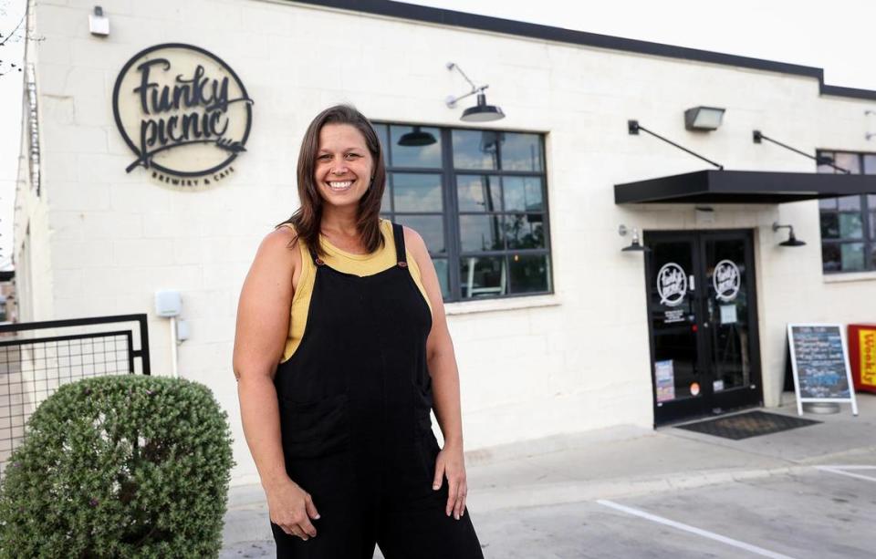 Co-owner Samantha Glen stands outside of Fort Worth Funky Picnic. The restaurant and brewery started hosting drag brunch in 2021. When Glen saw protests cropping up around drag shows, she started to put together resources for business owners on how to deal with, and prepare for, potential protests.