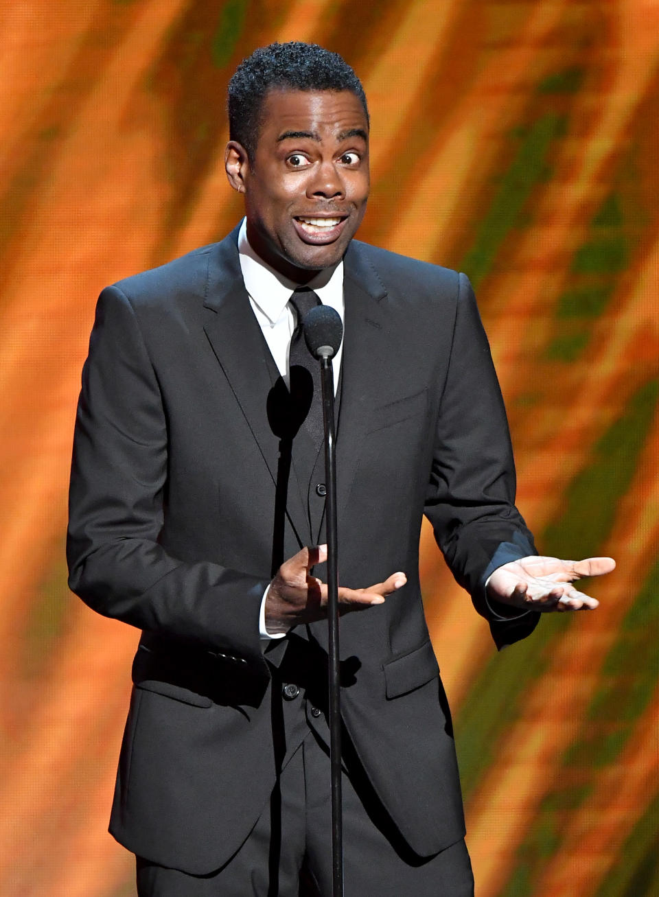 HOLLYWOOD, CALIFORNIA - MARCH 30: Chris Rock speaks onstage at the 50th NAACP Image Awards at Dolby Theatre on March 30, 2019 in Hollywood, California. (Photo by Earl Gibson III/Getty Images for NAACP)