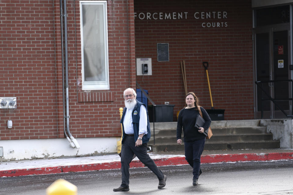 Latah County Prosecutor Bill Thompson, left, and Ashley Jennings, senior deputy prosecutor, leave the Latah County Courthouse, Wednesday, Jan. 4, 2023, in Moscow, Idaho. Bryan Kohberger, who is accused of killing four University of Idaho students in November, 2022, has left a Pennsylvania jail in the custody of state police, officials said Wednesday, which means he could be headed to Idaho to face first-degree murder charges. (AP Photo/Ted S. Warren)