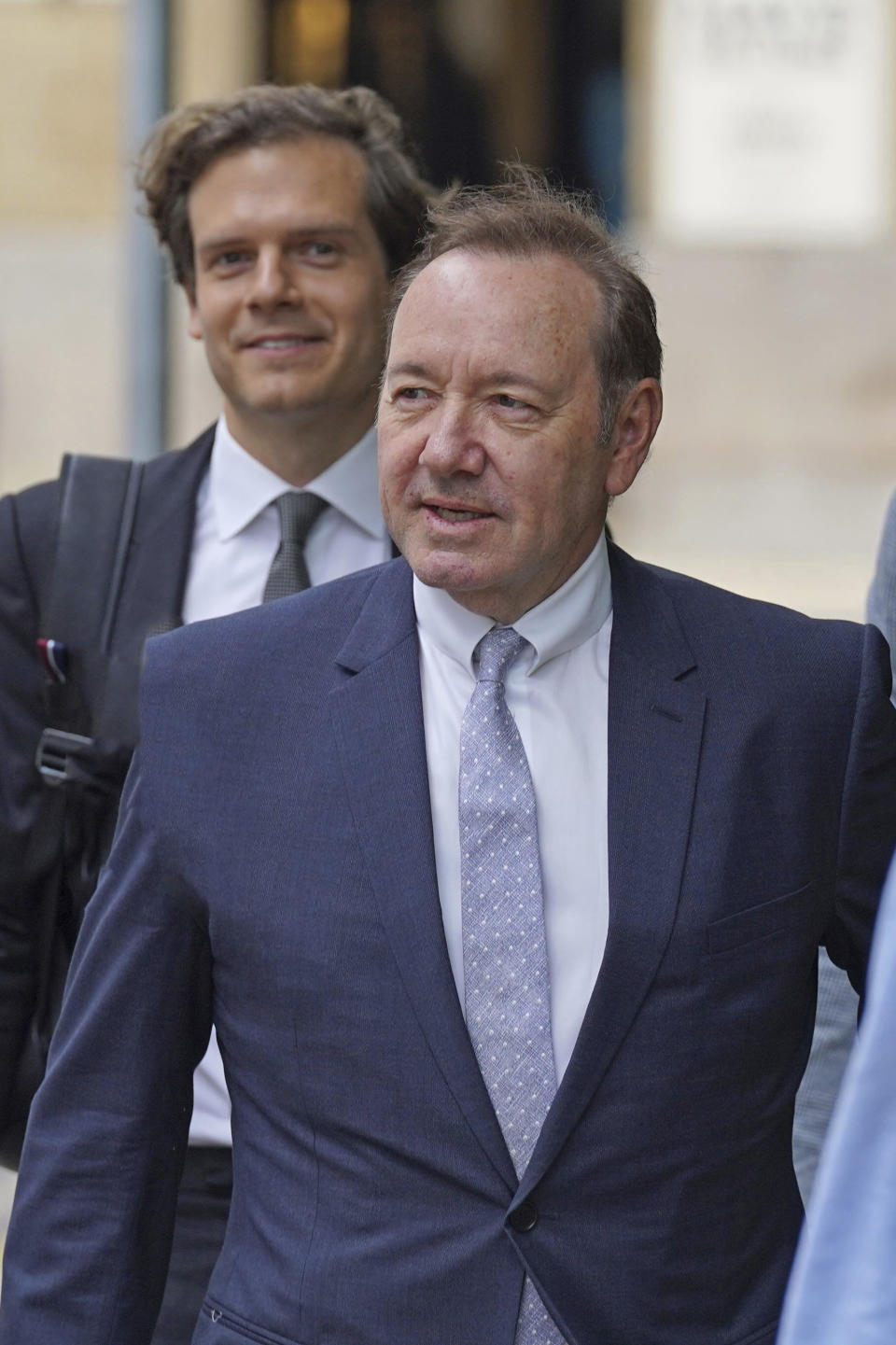 US Actor Kevin Spacey, front, arrives at Southwark Crown Court, London, Tuesday, July 4, 2023. Spacey is charged with three counts of indecent assault, seven counts of sexual assault, one count of causing a person to engage in sexual activity without consent and one count of causing a person to engage in penetrative sexual activity without consent between 2001 and 2005. (Lucy North/PA via AP)