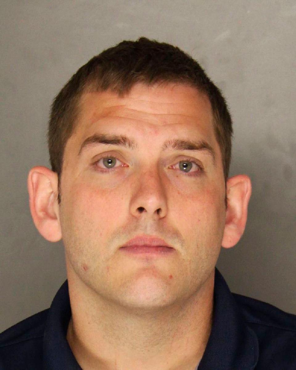 This undated photo provided by the Allegheny County District Attorney shows Michael Rosfeld, an East Pittsburgh, Pa., police officer. Rosfeld was charged with homicide, in the shooting death of Antwon Rose Jr. after a traffic stop June 19 in East Pittsburgh