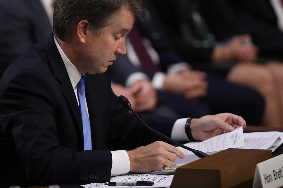 Judge Brett Kavanaugh reads from an email sent to him when working at the White House while answering questions from Sen. Patrick Leahy. (Photo: Win McNamee via Getty Images)