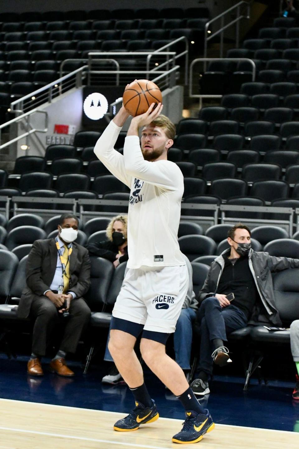 Indiana's Domantas Sabonis shoots a corner 3 during warmups as the Pacers host the Hornets at Gainbridge Fieldhouse in Indianapolis on Jan. 26, 2022.