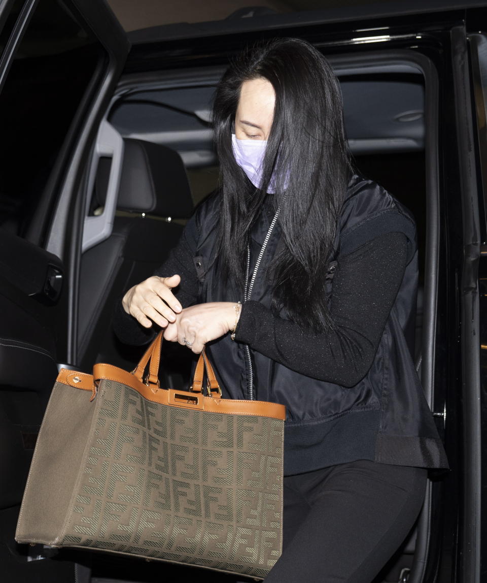 Chief Financial Officer of Huawei, Meng Wanzhou arrives at the British Columbia Supreme Court on Friday, Jan. 29, 2021, in Vancouver, British Columbia. (Jonathan Hayward/The Canadian Press via AP)