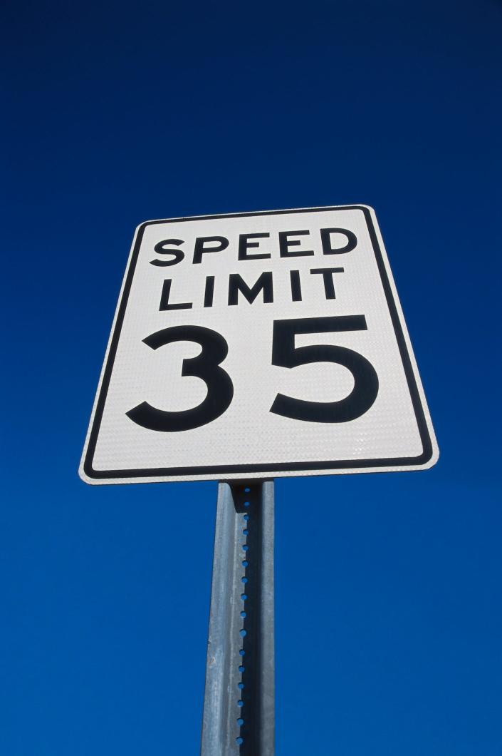 Limits post. Speed limit 35. Speed limit 13.